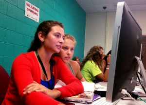 Yearbook students from North Farmington High School work on page design during the afternoon session.  They were focused on “making the yearbook worthwhile.” Kelly Martinek/ Photo