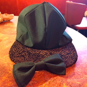 Murphy's snapback hat and bowtie. The hat will sell for 15 dollars.