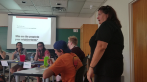Opinion Coverage instructor Christina Hammitt talks to her students about forming opinions. The biggest goal, Hammitt said, is to create change through opinion coverage.